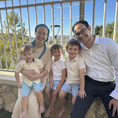 YU Graduate Moshe Pahmer, pictured at right with his family, has been enjoying the Reichman program and life in Israel.
